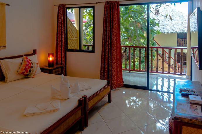 Imagen de la habitación del Hotel Alona Vida Beach Resort. Foto 4