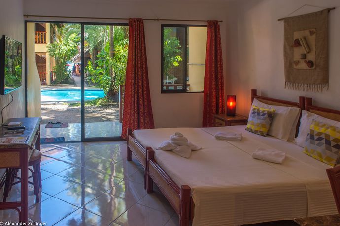 Imagen de la habitación del Hotel Alona Vida Beach Resort. Foto 5