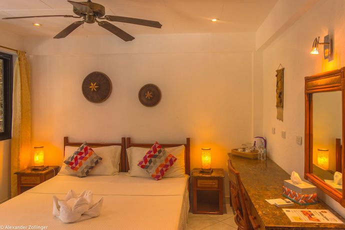 Imagen de la habitación del Hotel Alona Vida Beach Resort. Foto 16