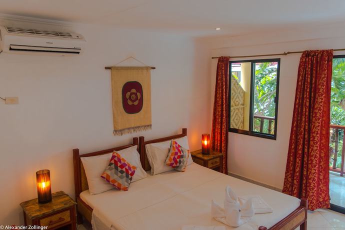 Imagen de la habitación del Hotel Alona Vida Beach Resort. Foto 19