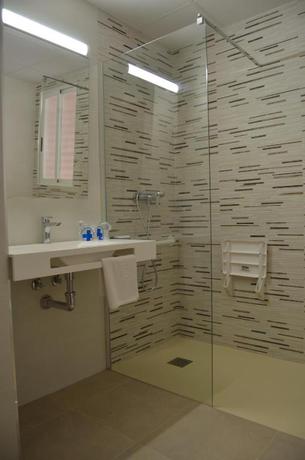 Imagen de la habitación del Hotel Alone. Foto 7