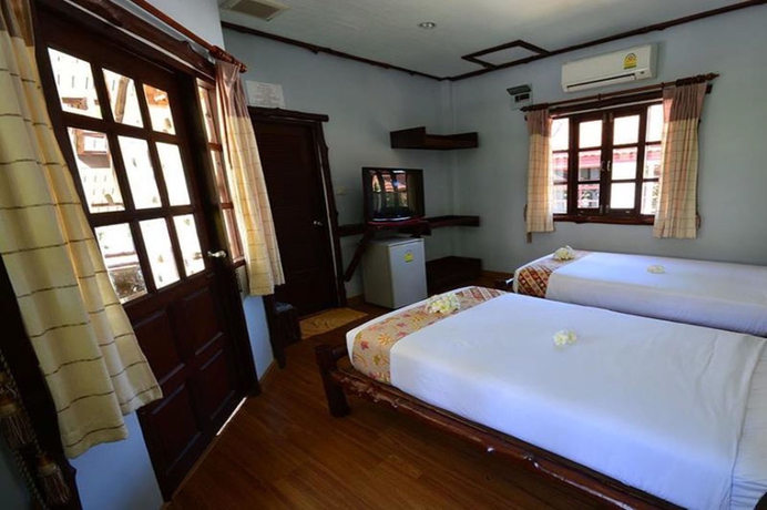 Imagen de la habitación del Hotel Alongkot Beach Resort Khanom. Foto 7