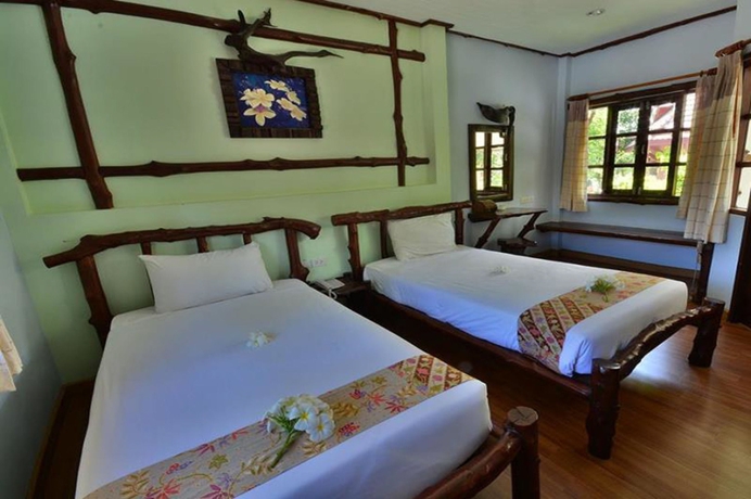 Imagen de la habitación del Hotel Alongkot Beach Resort Khanom. Foto 10
