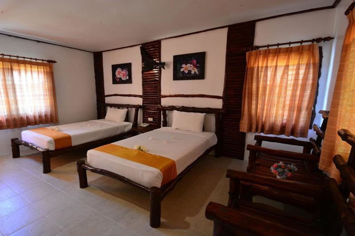 Imagen de la habitación del Hotel Alongkot Beach Resort Khanom. Foto 11