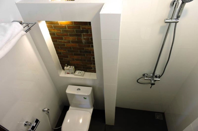 Imagen de la habitación del Hotel Alongkot Beach Resort Khanom. Foto 12