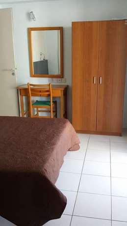 Imagen de la habitación del Hotel Alora Apartments. Foto 6
