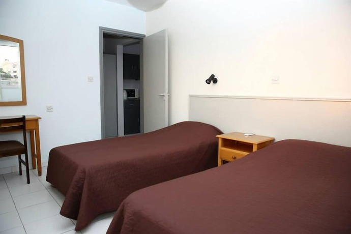 Imagen de la habitación del Hotel Alora Apartments. Foto 9