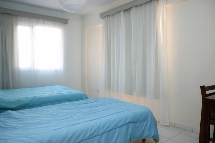 Imagen de la habitación del Hotel Alora Apartments. Foto 11