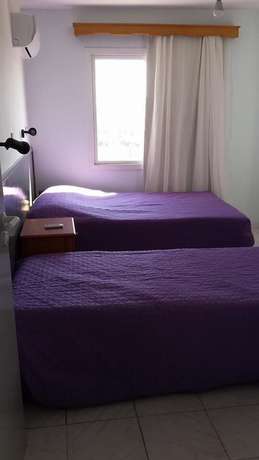 Imagen de la habitación del Hotel Alora Apartments. Foto 15