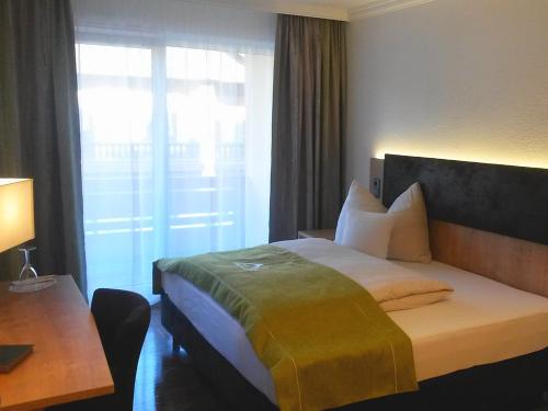 Imagen de la habitación del Hotel Alp Inn - Chiemgaukarte inclusive. Foto 6