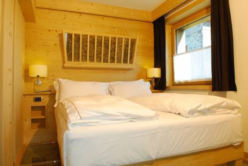 Imagen de la habitación del Hotel Alpen Chalet. Foto 3