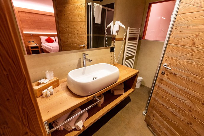 Imagen de la habitación del Hotel Alpen Garten Margherita. Foto 7