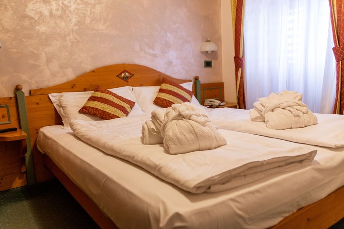 Imagen de la habitación del Hotel Alpen Garten Margherita. Foto 8