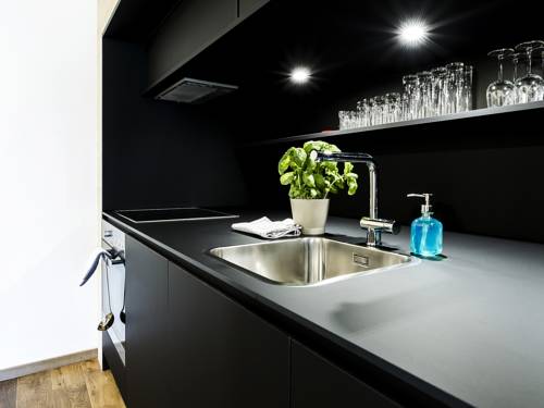 Imagen de la habitación del Hotel Alpen Select Apartments Kleinwalsertal. Foto 8