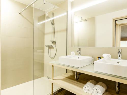 Imagen de la habitación del Hotel Alpen Select Apartments Kleinwalsertal. Foto 15