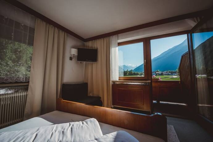 Imagen de la habitación del Hotel Alpenhaus Monte. Foto 20