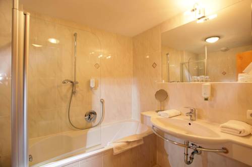 Imagen de la habitación del Hotel Alpenhof Brixen. Foto 4