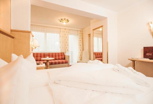 Imagen de la habitación del Hotel Alpenhof Kristall. Foto 6