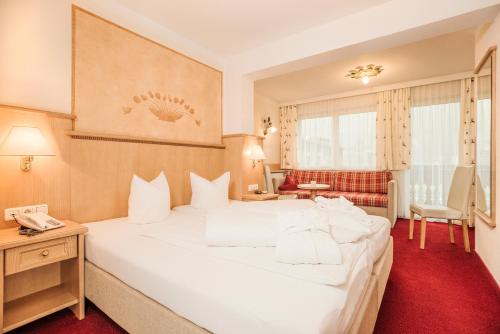 Imagen de la habitación del Hotel Alpenhof Kristall. Foto 7