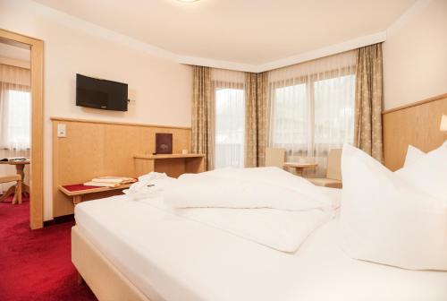 Imagen de la habitación del Hotel Alpenhof Kristall. Foto 8
