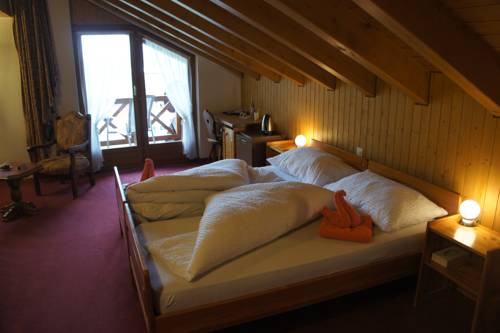 Imagen de la habitación del Hotel Alpenhof, OBERWALD. Foto 15