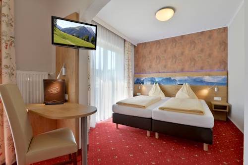 Imagen de la habitación del Hotel Alpenhof, Westendorf . Foto 9