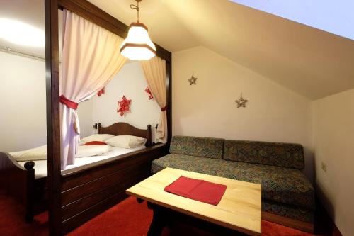 Imagen de la habitación del Hotel Alpenhotel Marcius. Foto 19