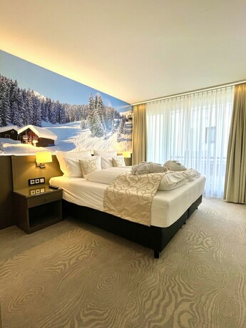 Imagen de la habitación del Hotel Alpenlodge Val Gronda. Foto 18