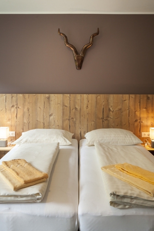 Imagen de la habitación del Hotel Alpenparks Montana Matrei. Foto 5