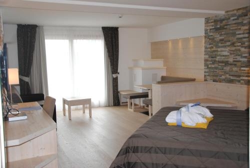 Imagen de la habitación del Hotel Alpenresort Belvedere. Foto 9
