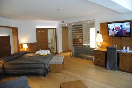 Imagen de la habitación del Hotel Alpenresort Belvedere. Foto 10