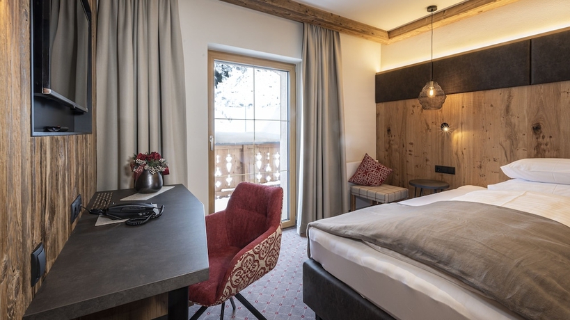 Imagen de la habitación del Hotel Alpenresort Fluchthorn. Foto 16