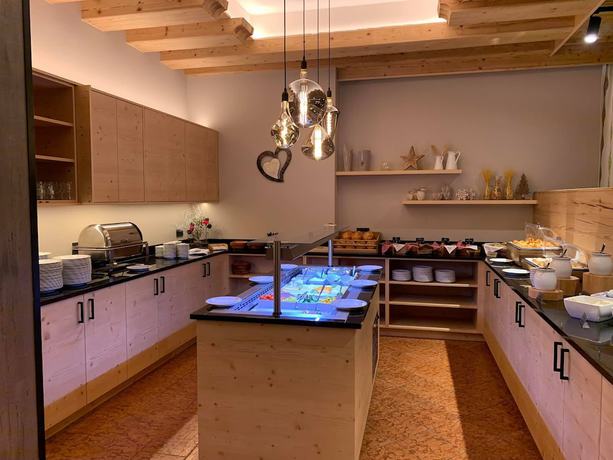 Imagen del bar/restaurante del Hotel Alpenrose M&uuml;hlbach am Hochk&ouml;nig. Foto 11