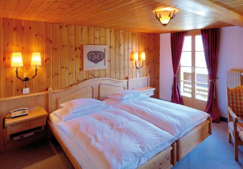 Imagen de la habitación del Hotel Alpenrose Wengen, Wengen. Foto 11