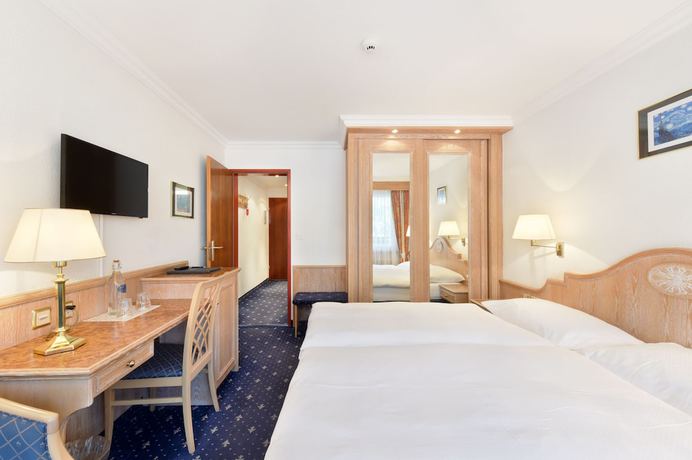 Imagen de la habitación del Hotel Alpenroyal. Foto 9