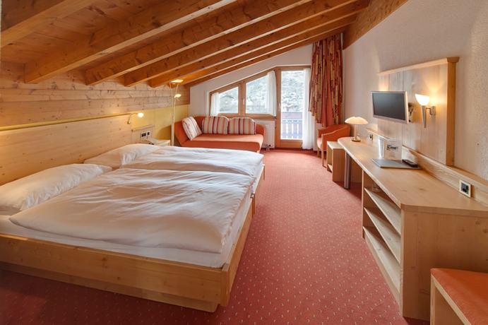 Imagen de la habitación del Hotel Alpenroyal. Foto 10