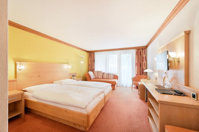 Imagen de la habitación del Hotel Alpenroyal. Foto 11