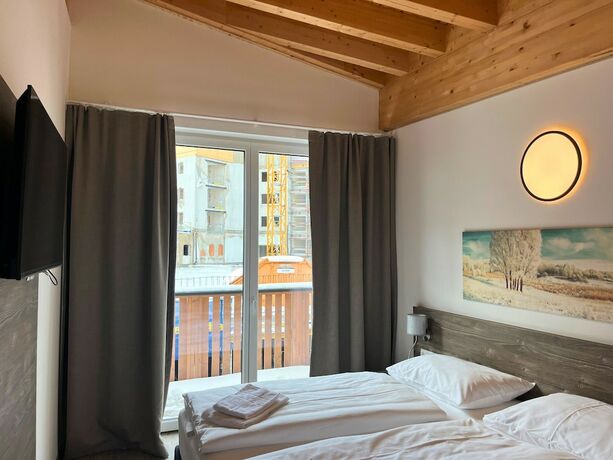 Imagen de la habitación del Hotel Alpenstyle Resort Fieberbrunn. Foto 17