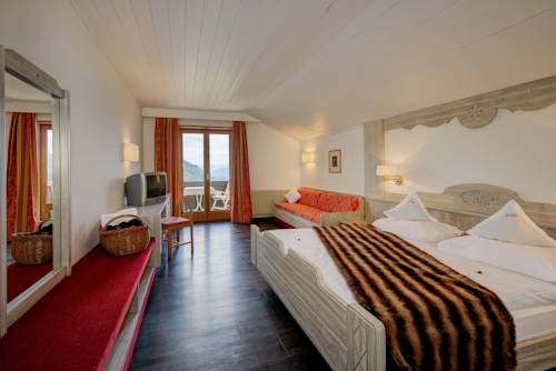 Imagen de la habitación del Hotel Alpentirolis. Foto 5