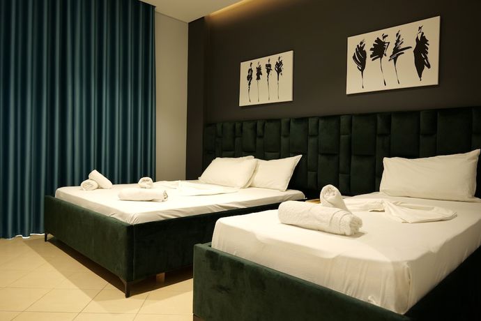 Imagen de la habitación del Hotel Alpha, Gjasht&euml;. Foto 15