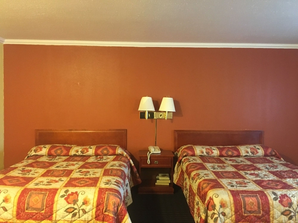 Imagen de la habitación del Hotel Alpha Inn and Suites. Foto 10