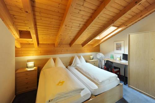 Imagen de la habitación del Hotel Alpha Thun. Foto 11
