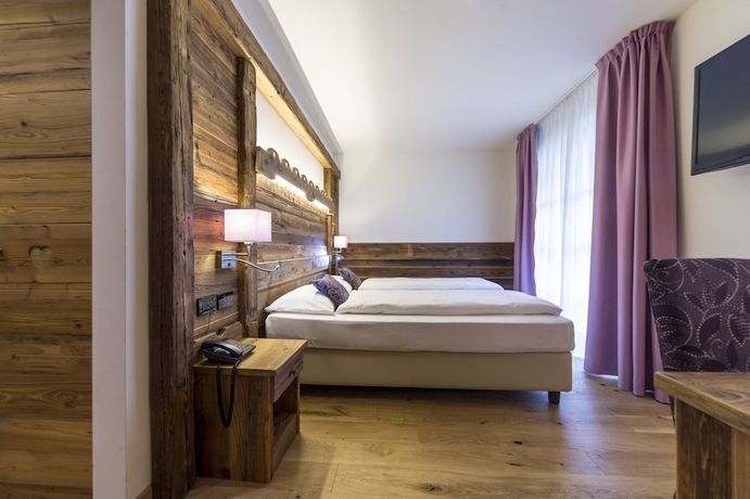 Imagen de la habitación del Hotel Alpholiday Dolomiti Wellness. Foto 2