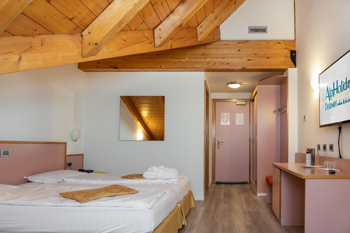 Imagen de la habitación del Hotel Alpholiday Dolomiti Wellness. Foto 5