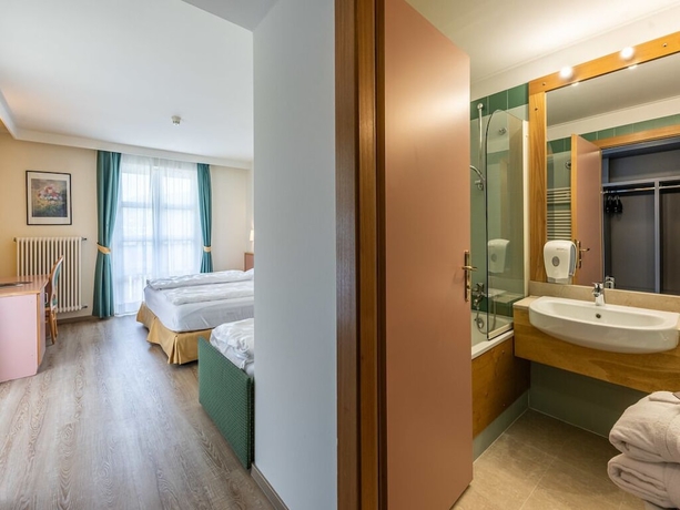 Imagen de la habitación del Hotel Alpholiday Dolomiti Wellness. Foto 8