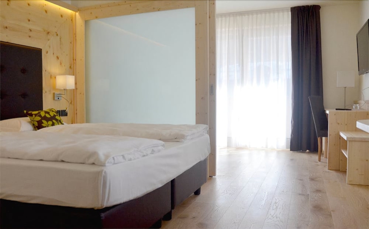 Imagen de la habitación del Hotel Alpholiday Dolomiti Wellness. Foto 12