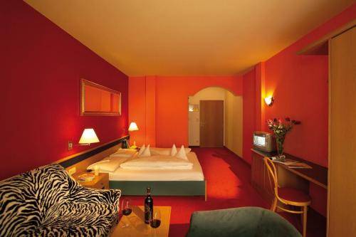 Imagen de la habitación del Hotel Alphotel Stocker. Foto 11