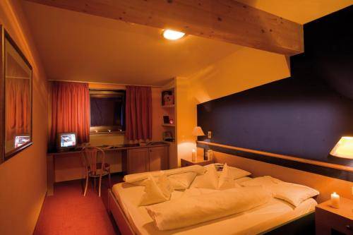 Imagen de la habitación del Hotel Alphotel Stocker. Foto 12