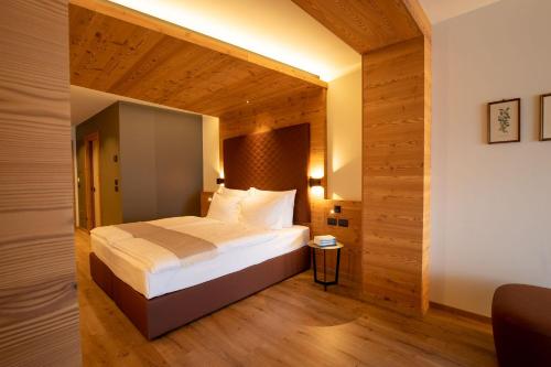 Imagen de la habitación del Hotel Alpi, Campitello di Fassa. Foto 18