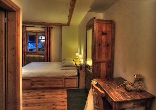 Imagen de la habitación del Hotel Alpi & Golf. Foto 6